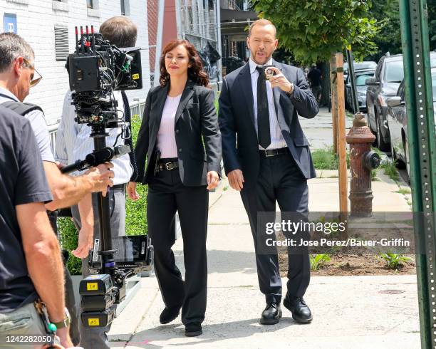 Donnie Wahlberg and Marisa Ramirez are seen at the film set of the 'Blue Bloods' TV Series in Greenpoint, Brooklyn on August 02, 2022 in New York...