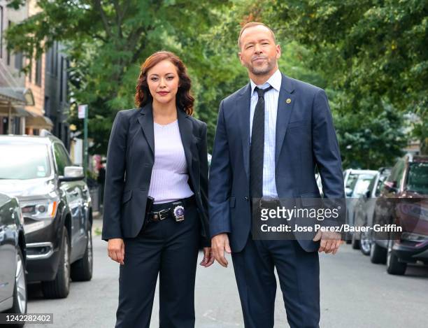 Donnie Wahlberg and Marisa Ramirez are seen at the film set of the 'Blue Bloods' TV Series in Greenpoint, Brooklyn on August 02, 2022 in New York...