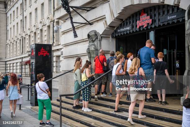 Tourists queue for the London Dungeon attraction in London, UK, on Wednesday, Aug. 3, 2022. It's never been more expensive to get a hotel room in...