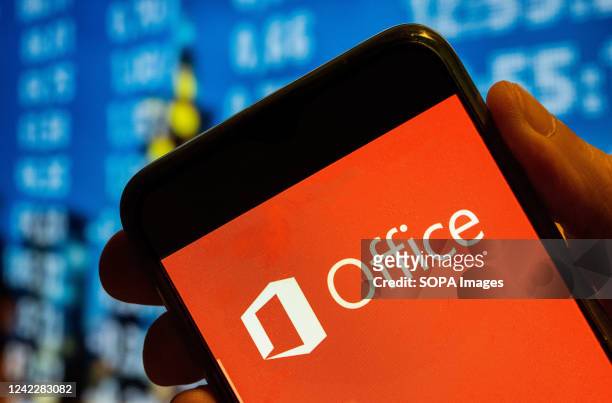 In this photo illustration, the American software multinational technology company Microsoft, Office, logo is displayed on a smartphone screen.