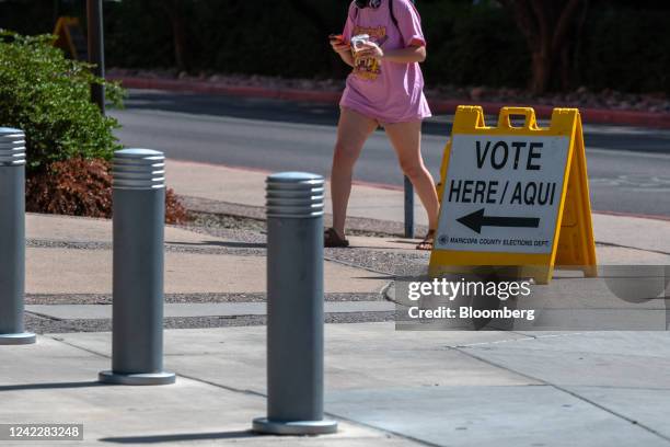 Voter arrives to a polling location at Arizona State University in Tempe, Arizona, US, on Tuesday, Aug. 2, 2022. Donald Trump endorsed venture...