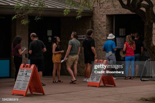 Voters line up at a polling location at Indian Bend Wash Visitors Center in Scottsdale, Arizona, US, on Tuesday, Aug. 2, 2022. Donald Trump endorsed...
