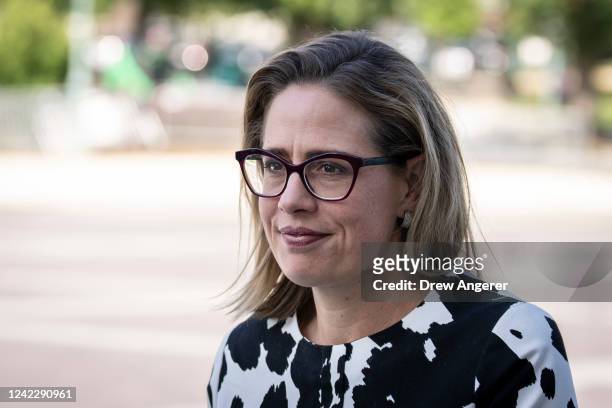 Sen. Kyrsten Sinema arrives at the U.S. Capitol for a vote August 3, 2022 in Washington, DC. The Senate is voting on a resolution to ratify Finland...