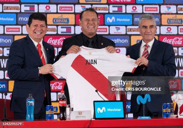 Peruvian former footballer and new head coach of Peru's national team Juan Reynoso , President of the Peruvian Football Federation Agustin Lozano and...