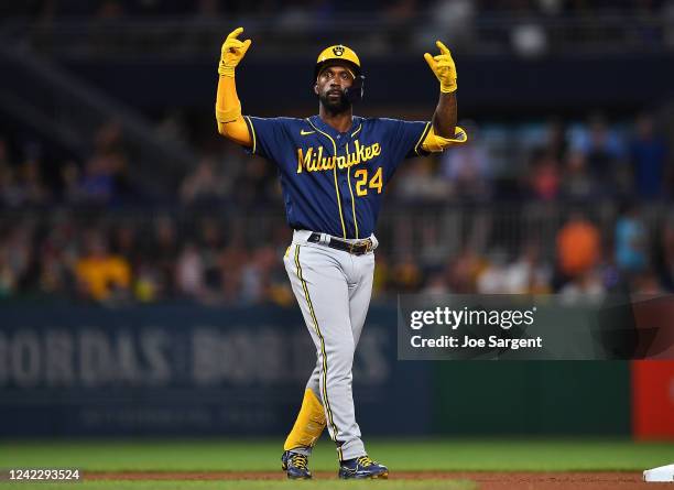 Andrew McCutchen of the Milwaukee Brewers reacts after hitting a double during the fifth inning against the Pittsburgh Pirates at PNC Park on August...