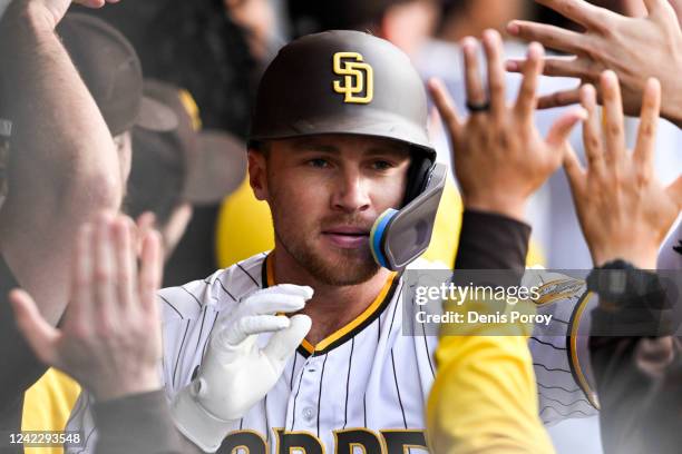 Brandon Drury of the San Diego Padres celebrates his grand slam in the first inning against the Colorado Rockies August 3, 2022 at Petco Park in San...