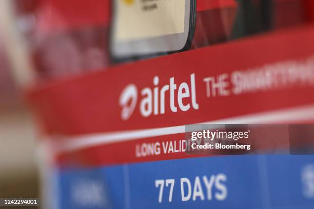 An advertisement of Bharti Airtel Ltd. At a mobile phone service store in Mumbai, India, on Wednesday, Aug. 3, 2022. The South Asian nation sold...