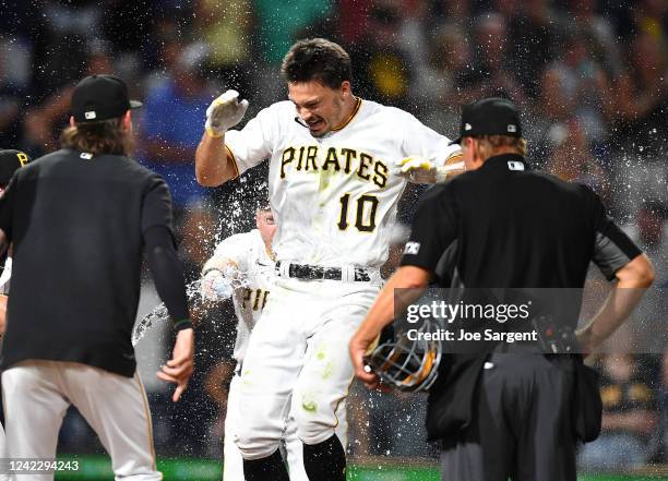 Bryan Reynolds of the Pittsburgh Pirates celebrates his solo home run during the ninth inning against the Milwaukee Brewers at PNC Park on August 3,...