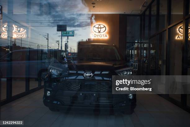 Toyota Motor vehicle inside a dealership after normal business hours in Sapporo, Japan, on Wednesday, Aug. 3, 2022. Toyota Motor is scheduled to...