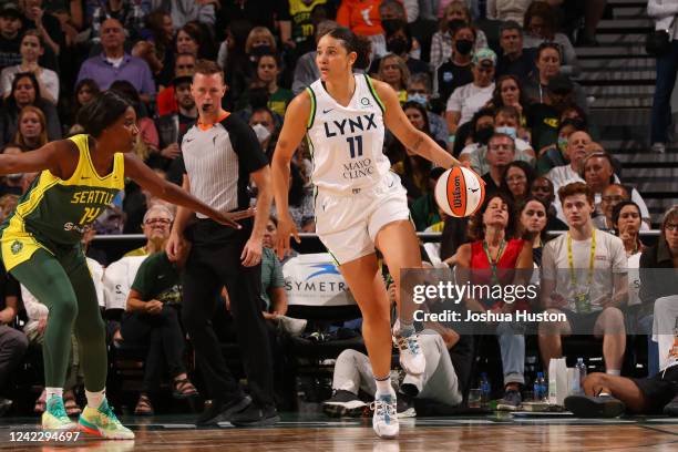 Natalie Achonwa of the Minnesota Lynx handles the ball during the game against the Seattle Storm on August 3, 2022 at the Climate Pledge Arena in...