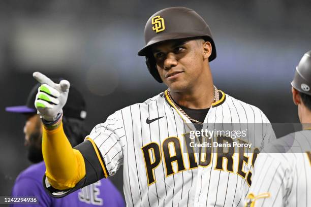 Juan Soto of the San Diego Padres points back to the dugout after hitting a single in the eighth inning against the Colorado Rockies August 3, 2022...