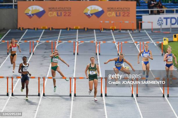 Women compete in the 400 meter quaification round during the World Athletics Under 20 Championships, in Cali, Colombia on August 3, 2022.