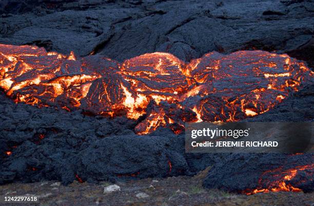 Lava flows at the scene of the newly erupted volcano at Grindavik, Iceland on August 3, 2022. A volcano erupted on August 3, 2022 in Iceland in a...
