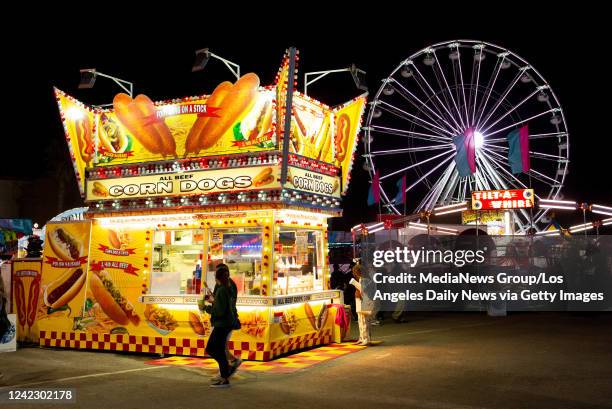 Ventura, CA Ventura, CA Ventura, CA The corn dog stand lights up the night at the Ventura County fair Wednesday, August 3, 2022. The fair runs from...