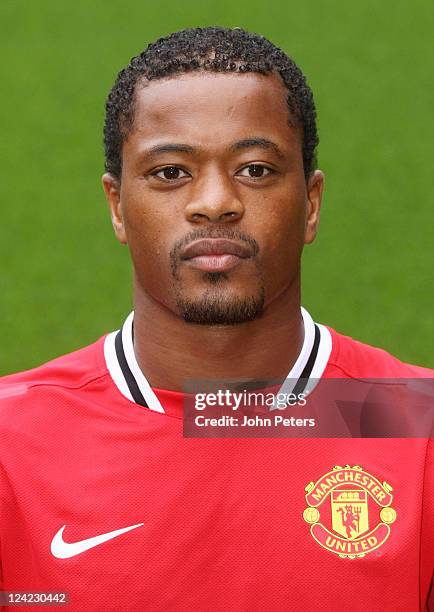 Patrice Evra of Manchester United poses at the annual club photocall at Old Trafford on September 9, 2011 in Manchester, England.