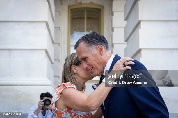 Sen. Kyrsten Sinema talks with Sen. Mitt Romney outside the U.S. Capitol August 4, 2022 in Washington, DC. Negotiations continue on the Senate budget...