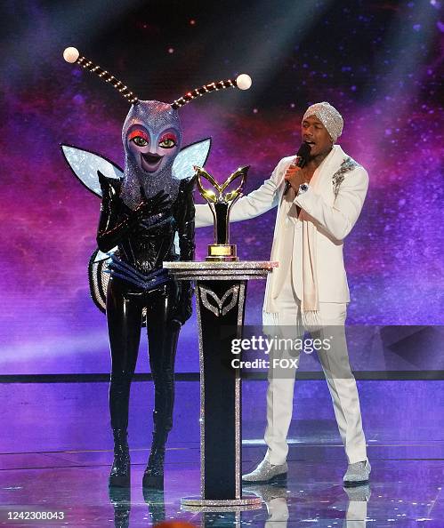 Firefly Singer Firefly and host Nick Cannon in THE MASKED SINGER season finale... News ...