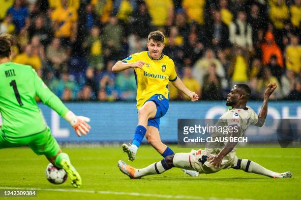 Brondby's Croatian forward Marko Divkovic scores a goal past FC Basel's Ghanaian defender Kasim Adams during the UEFA Europa Conference League third...