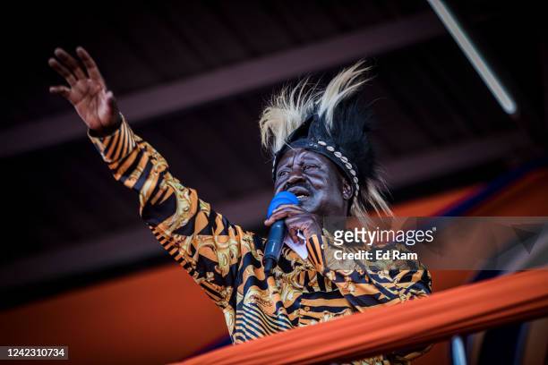 Kenya's Azimio La Umoja Party presidential candidate Raila Odinga, wearing a traditional Luo hat, addresses the crowd during a campaign rally in Jomo...
