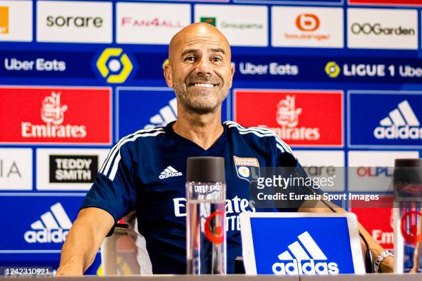 Olympique Lyon Head Coach Peter Bosz talks during the press conference after the training session at Groupama OL Training Center on August 3, 2022 in...