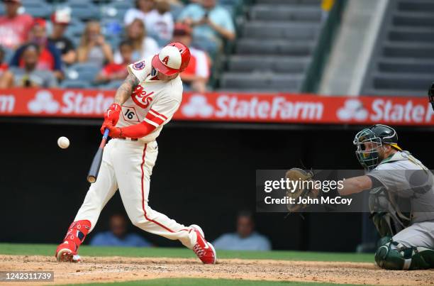 Mickey Moniak of the Los Angeles Angels hits a home run in the ninth inning against the Oakland Athletics at Angel Stadium of Anaheim on August 4,...