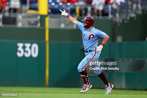 Rhys Hoskins of the Philadelphia Phillies gestures after he hit a home run against the Washington Nationals during the first inning of a game at...