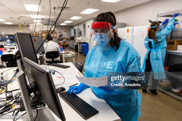 Microbiologists with the AEGIS Sciences Corporation process Covid-19 and Monkeypox tests at its facility in Nashville, Tennessee, United States on...