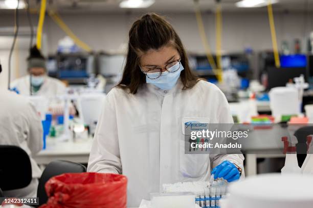 Microbiologists with the AEGIS Sciences Corporation process Covid-19 and Monkeypox tests at its facility in Nashville, Tennessee, United States on...