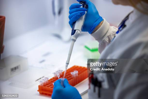 Microbiologists with the AEGIS Sciences Corporation process Covid-19 and Monkeypox tests at its facility in Nashville, Tennessee, United States on...