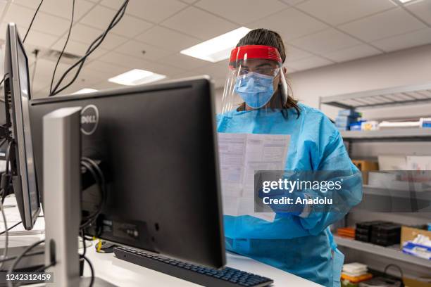 Microbiologists with the AEGIS Sciences Corporation process Covid-19 and Monkeypox tests at its facility in Nashville, Tennessee, United States on...