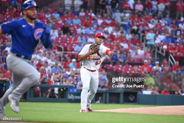 Jose Quintana of the St. Louis Cardinals throws out Willson Contreras of the Chicago Cubs at first base in the first inning in game two of a double...