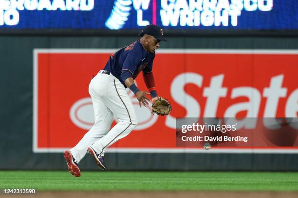 Jorge Polanco of the Minnesota Twins can't catch a ball hit by Lourdes Gurriel Jr. #13 of the Toronto Blue Jays in the ninth inning of the game at...