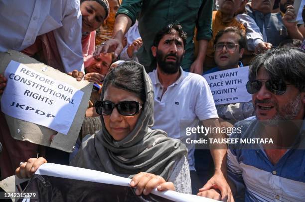 Peoples Democratic Party's leader Mehbooba Mufti along with supporters protest against the scrapping of Article 370 of Jammu and Kashmir, in Srinagar...