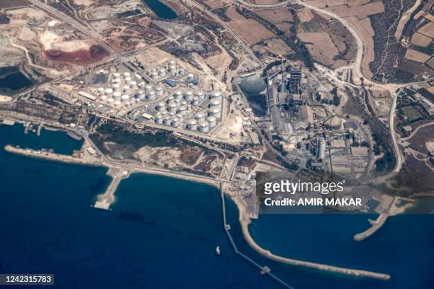 This picture taken on July 20, 2022 shows an aerial view of the industrial complex at the port of Vasiliko , including the liquefied natural gas...