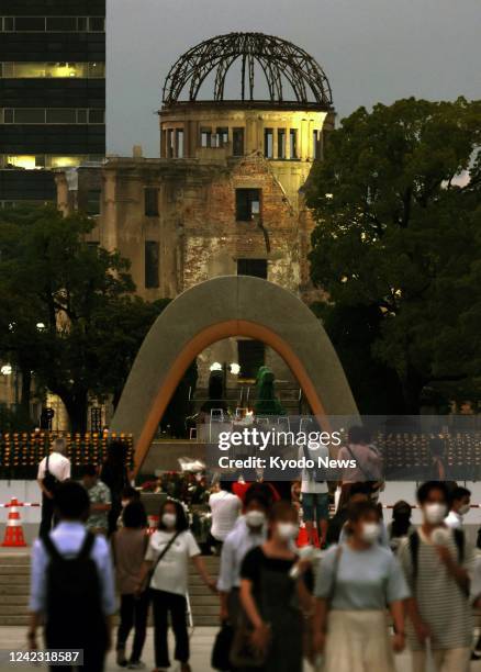 People visit the Peace Memorial Park in Hiroshima on Aug. 5 the eve of the 77th anniversary of the U.S. Atomic bombing of the western Japan city.
