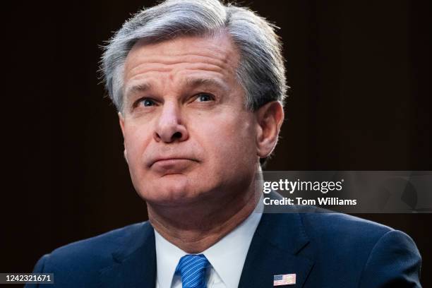 Director Christopher Wray, testifies during the Senate Judiciary Committee hearing titled Oversight of the Federal Bureau of Investigation, in Hart...