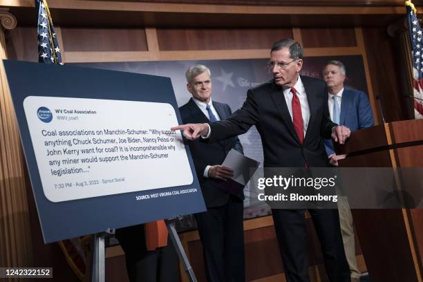 Senator John Barrasso, a Republican from Wyoming, points to a poster while speaking during a news conference in Washington, D.C., US, on Friday, Aug....