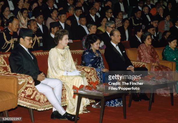 Queen Elizabeth II and Prince Philip sitting alongside King Birendra and Queen Aishwarya of Nepal during their five-day visit to Kathmandu, Nepal on...