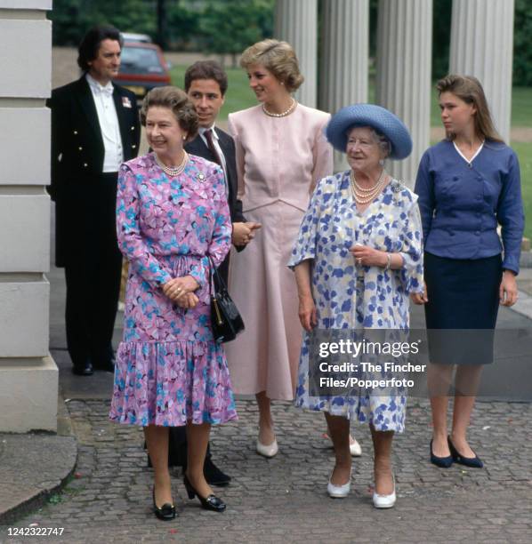 Queen Elizabeth II, Princess Diana , Viscount Linley and Sarah Armstrong-Jones celebrating the 88th birthday of the Queen Mother at the royal...