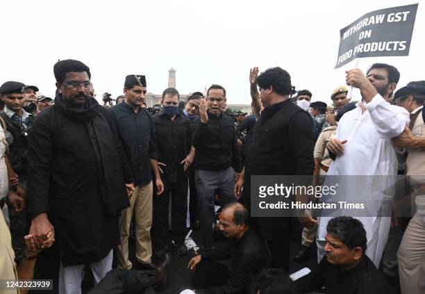 Congress Party MPs Rahul Gandhi, K.C. Venugopal, Adhir Ranjan Chowdhury and others MPs wearing black clothes, Protest march Parliament House towards...
