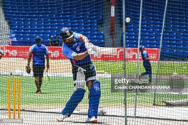 Rohit Sharma, of India takes a shot during the practice session before the fourth T20I match between West Indies and India at the Central Broward...