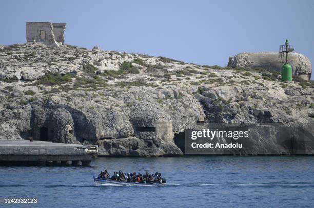 Boat with migrants seen entering in Lampedusa harbour in Lampedusa, Italy on August 04, 2022. Three landing operations of migrants, nearly 100 people...