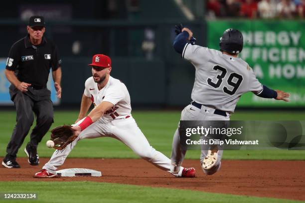 Jose Trevino of the New York Yankees is caught stealing second base against Paul DeJong of the St. Louis Cardinals in the sixth inning at Busch...