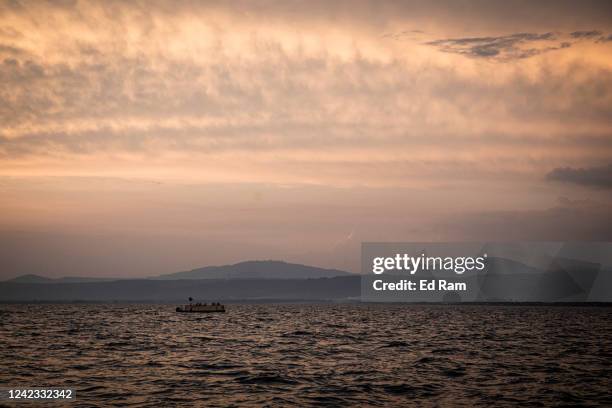 Boat is seen on Lake Victoria on August 5, 2022 in Kisumu, Kenya. The fishing industry, which has been negatively impacted by climate change, is a...