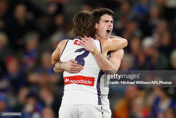 Caleb Serong and Andrew Brayshaw of the Dockers celebrate during the 2022 AFL Round 21 match between the Western Bulldogs and the Fremantle Dockers...