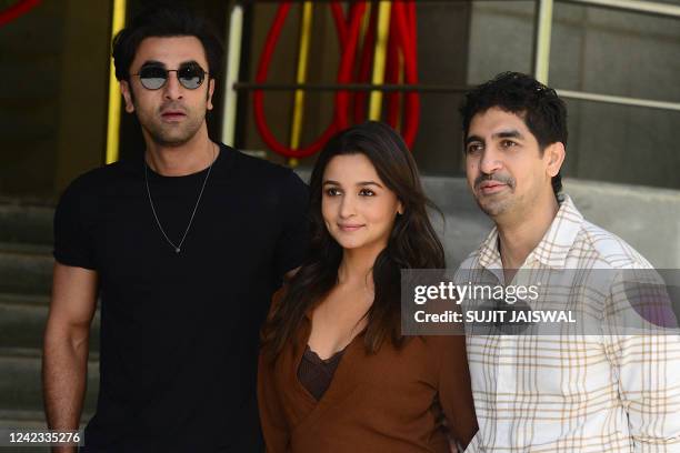 Bollywood actors Ranbir Kapoor, Alia Bhatt and director Ayan Mukerji gesture during the promotion of their upcoming Hindi film Brahm?stra: Part One...