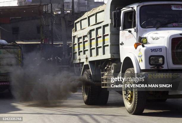 Black smoke comes out of the exhaust pipe of a truck, in Kahtmandu 26 January 2007. Once seen as a Himalayan Shangri La, Nepal's capital city and its...