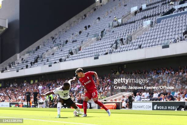 General view of action in front of the Riverside stand during the Premier League match between Fulham FC and Liverpool FC at Craven Cottage on August...