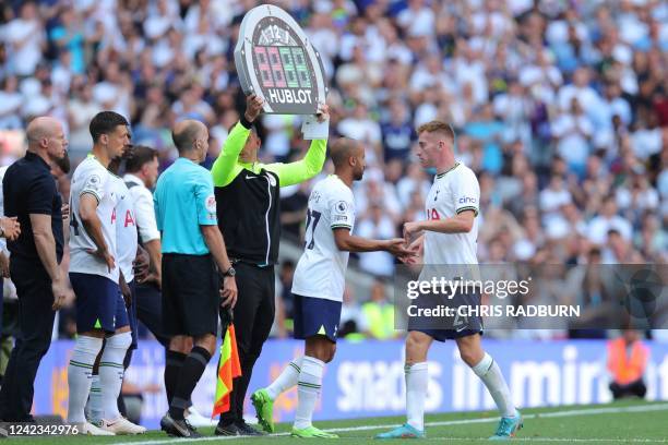 Tottenham Hotspur's Brazilian midfielder Lucas Moura comes on as a substitute to replace Tottenham Hotspur's Swedish midfielder Dejan Kulusevski...