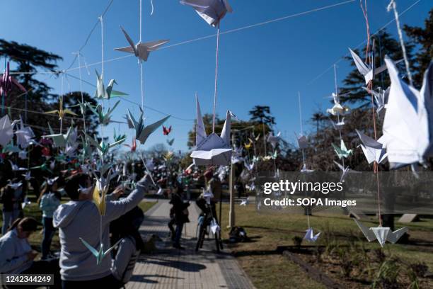 High school students of Firmat, hang a thousand origami cranes during "A Day for Peace" event marking the 77th anniversary of the atomic bombing of...